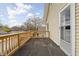 Enjoy outdoor relaxation on this private deck with wood railings and a sliding door at 310 W 43Rd St, Indianapolis, IN 46208