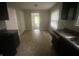 View of the functional kitchen, which offers ample space and natural light at 3202 Acacia Dr, Indianapolis, IN 46214