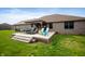 Inviting outdoor space features a wooden patio perfect for Gathering gatherings at 3300 E Indian Hill Dr, Muncie, IN 47302