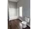 Bright bathroom featuring a shower and updated fixtures at 3502 N Illinois St, Indianapolis, IN 46208