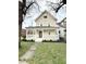 Charming two-story home with a covered front porch and well-maintained landscaping at 3502 N Illinois St, Indianapolis, IN 46208
