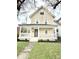 Charming two-story home with a covered front porch and well-maintained landscaping at 3502 N Illinois St, Indianapolis, IN 46208