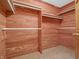 Cedar closet with wood paneling and storage shelves at 3504 Morgan Oaks Cir, Martinsville, IN 46151