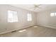 Bright bedroom with modern flooring, neutral paint and a ceiling fan at 3550 Winings Ave, Indianapolis, IN 46221