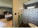This ensuite bathroom has a shower with patterned shower curtain at 3689 S County Road 800 W, Coatesville, IN 46121