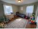 Inviting bedroom with hardwood floors, ample natural light, and plenty of space for play and rest at 3689 S County Road 800 W, Coatesville, IN 46121