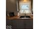 Kitchen sink with black faucet and butcher block countertops at 3689 S County Road 800 W, Coatesville, IN 46121