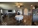 Open living area connects to a dining area and a kitchen with stainless appliances at 3689 S County Road 800 W, Coatesville, IN 46121