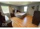 Spacious main bedroom with hardwood floors and ample natural light at 3689 S County Road 800 W, Coatesville, IN 46121