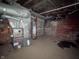 Unfinished basement with mechanicals at 408 E Beecher St, Indianapolis, IN 46225