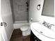 This bathroom features a shower and tub combination with modern fixtures at 408 E Beecher St, Indianapolis, IN 46225