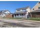 Well-kept two-story duplex with a fenced yard and inviting curb appeal at 408 E Beecher St, Indianapolis, IN 46225