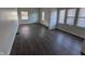 An empty living room featuring a large window for natural light at 408 E Beecher St, Indianapolis, IN 46225