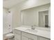 A bright bathroom with a white vanity, large mirror, and shower-tub combo for relaxation at 4087 Railhead Ave, Westfield, IN 46074