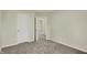 The bedroom offers a serene atmosphere with neutral walls, carpet, and doorways to other rooms at 4087 Railhead Ave, Westfield, IN 46074