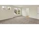 This bedroom features plush carpeting, multiple windows offering ample natural light, and neutral paint at 4087 Railhead Ave, Westfield, IN 46074
