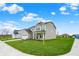 Newly built two-story house with fresh lawn, a two-car garage and inviting covered front porch at 4087 Railhead Ave, Westfield, IN 46074