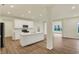 Bright kitchen with white cabinets, stainless steel appliances, and a spacious island at 4087 Railhead Ave, Westfield, IN 46074