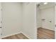 A spacious laundry room with hookups, a bright light, and wood look floors, ready for appliances at 4087 Railhead Ave, Westfield, IN 46074