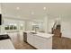 Bright open living space featuring wood floors and large windows overlooking the neighborhood at 4087 Railhead Ave, Westfield, IN 46074
