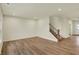 Spacious living room featuring hardwood flooring, recessed lighting, and a staircase at 4087 Railhead Ave, Westfield, IN 46074