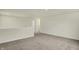 A spacious loft provides an additional living area, featuring neutral carpeting and an open layout at 4087 Railhead Ave, Westfield, IN 46074