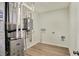 A utility room containing a modern furnace, a water heater, and the necessary hookups at 4087 Railhead Ave, Westfield, IN 46074