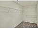 This walk-in closet offers ample storage with multiple wire shelves for organized storage at 4087 Railhead Ave, Westfield, IN 46074