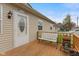 Welcoming front porch with a charming bench and decorative items, perfect for relaxing outdoors at 409 W Pike St, Martinsville, IN 46151