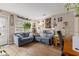 Bright and inviting living room with hardwood floors, comfortable sofas, and large windows at 409 W Pike St, Martinsville, IN 46151