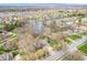 Beautiful neighborhood with homes near the lake and ponds, featuring tree-lined streets and scenic views at 454 Roberson Blvd, Mooresville, IN 46158