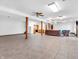 Finished basement with tiled floors, a fireplace and a partial kitchen with white appliances at 454 Roberson Blvd, Mooresville, IN 46158