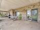 Spacious covered patio with a brick exterior, perfect for outdoor relaxation and entertainment at 454 Roberson Blvd, Mooresville, IN 46158