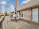 Inviting deck area with outdoor seating, ideal for enjoying the serene backyard and relaxing outdoors at 454 Roberson Blvd, Mooresville, IN 46158