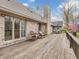Charming deck featuring comfortable seating with scenic views, perfect for enjoying the peaceful outdoor space at 454 Roberson Blvd, Mooresville, IN 46158