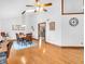 Bright dining room featuring hardwood floors, vaulted ceilings, and stylish pendant lighting at 454 Roberson Blvd, Mooresville, IN 46158