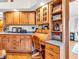 Functional kitchen area featuring custom cabinets and a dedicated desk space at 454 Roberson Blvd, Mooresville, IN 46158