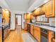 Spacious kitchen with wooden cabinets, and stainless steel sink and appliances at 454 Roberson Blvd, Mooresville, IN 46158