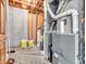 Utility area with furnace, water heater, pipes, and other mechanical components at 454 Roberson Blvd, Mooresville, IN 46158