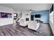 Cozy living room featuring a fireplace, ceiling fan, and comfortable seating at 5374 Marigold Dr, Plainfield, IN 46168