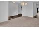 Spacious living room showcases neutral carpet and white walls, flooded with natural light at 5374 Marigold Dr, Plainfield, IN 46168