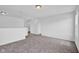 Bright, airy living room space with neutral carpet and recessed lighting at 5374 Marigold Dr, Plainfield, IN 46168