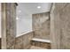 Modern shower featuring tile walls and a glass partition, creating a luxurious space at 5374 Marigold Dr, Plainfield, IN 46168