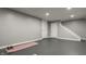Spacious, unfinished basement with concrete floors, and white trim at 564 N Beville Ave, Indianapolis, IN 46201