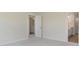 Open bedroom layout leading to bathroom, highlighting easy access and modern design at 5804 Summertree Pl, Whitestown, IN 46052