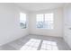Well-lit bedroom with carpet, windows, and views of the neighborhood at 5804 Summertree Pl, Whitestown, IN 46052