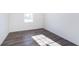 A cozy bedroom featuring hardwood flooring and great natural light at 5804 Summertree Pl, Whitestown, IN 46052