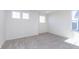 Bright, spacious bedroom with three windows for lots of natural light and soft, neutral carpet at 5804 Summertree Pl, Whitestown, IN 46052