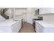 A beautifully designed kitchen featuring stainless steel appliances, and a central island with sleek countertops at 5804 Summertree Pl, Whitestown, IN 46052