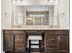 Bathroom featuring a vanity with a stool and a large mirror reflecting the walk-in shower at 6472 W Treeline Ln, McCordsville, IN 46055